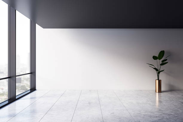 istock Modern empty office corner with large windows and potted plant. 3D Rendering 2177369434