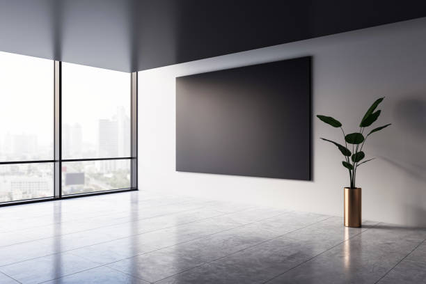 istock Modern office interior with blank wall and large window overlooking cityscape. 3D Rendering 2177369437