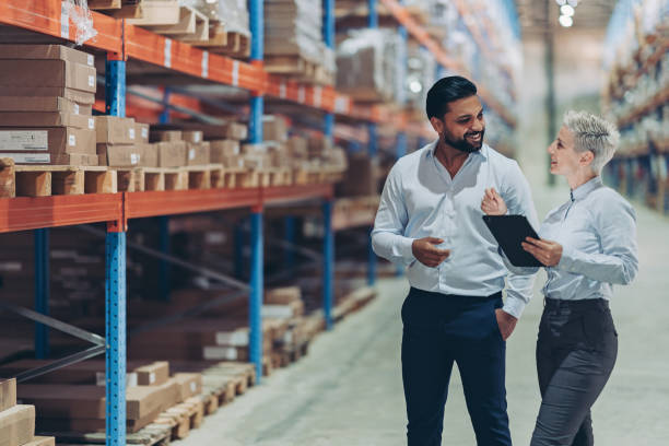 istock Business people organizing the export containers in a warehouse 2177371319