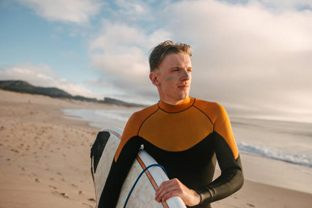 istock Portrait of a surfer at sunset 2177373002