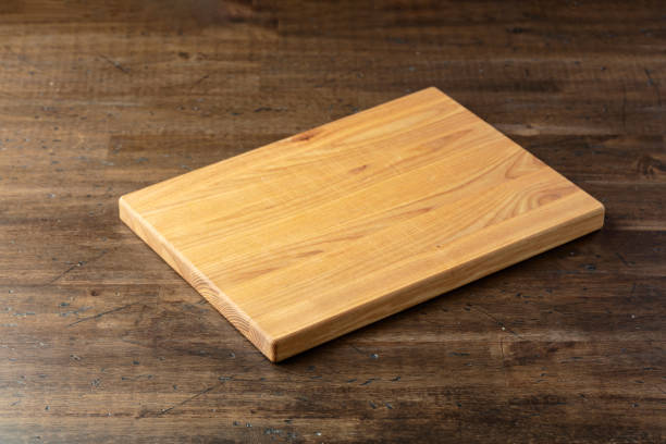 istock Cutting board on a wooden table. 2177374248