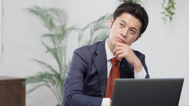 istock A businessman worried in front of a computer 2177374310