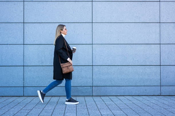 istock Mature woman walking in city 2177374612