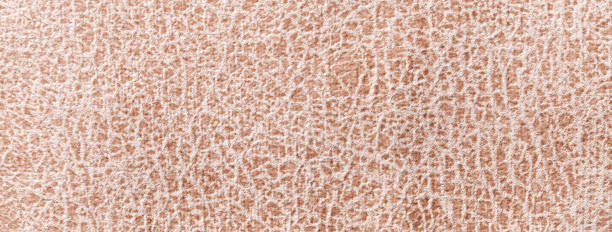 istock Light beige background fabric with wavy pattern, closeup. Velvet texture of seamless brown textile, macro. 2177378155