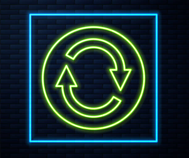 istock Glowing neon line Recycle symbol icon isolated on brick wall background. Circular arrow icon. Environment recyclable go green. Vector 2177378908