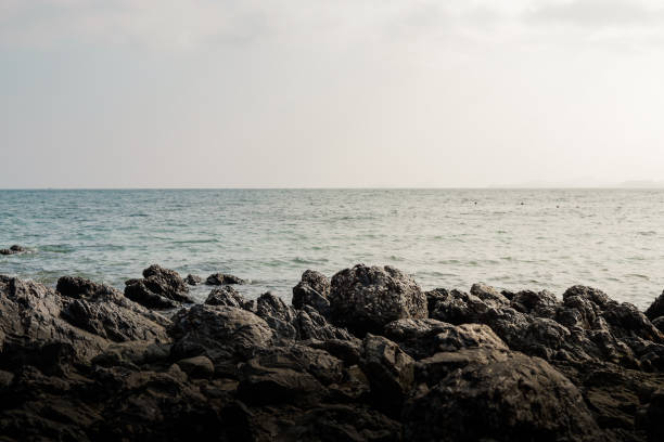 istock Evening landscape of rocks and vast sea. 2177380102