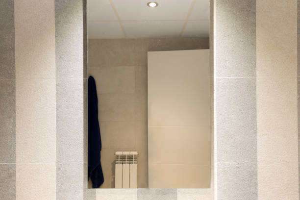 istock A bathroom mirror with a towel hanging on it 2177380153