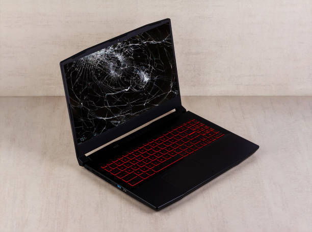 istock black gaming laptop with broken screen on a gray background side view 2177381186