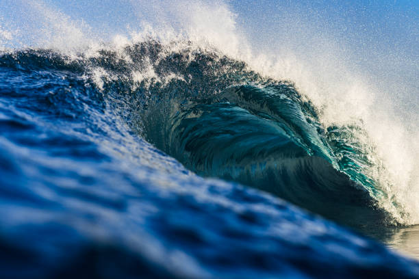 istock Close up of blue wave breaking in the ocean with soft afternoon light 2177382747