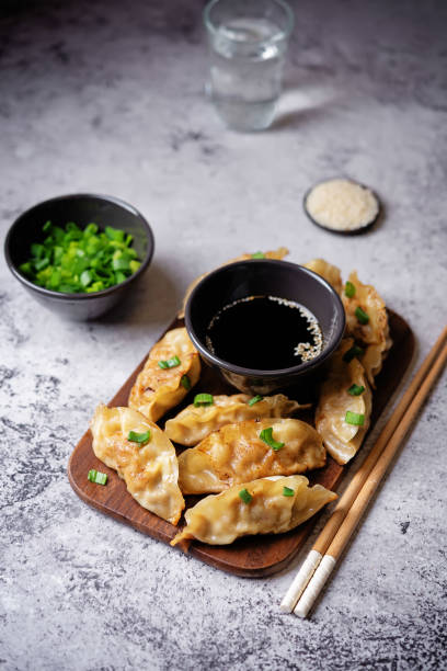 istock Dumplings fried with soy sauce. and sesame seeds 2177384340