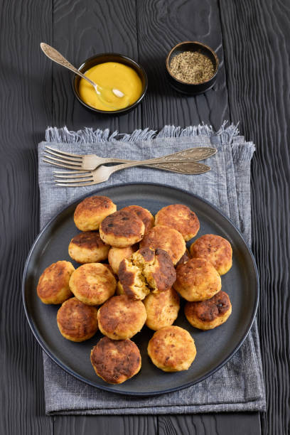 istock Northern Pike fish cakes on dark grey plate 2177385672