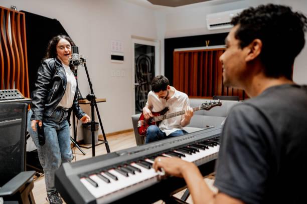 istock Friends singing and playing at music studio 2177391560