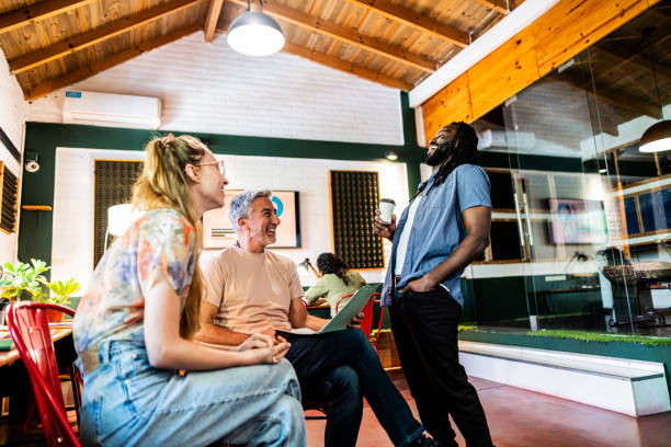 istock Coworkers talking on the office 2177392820