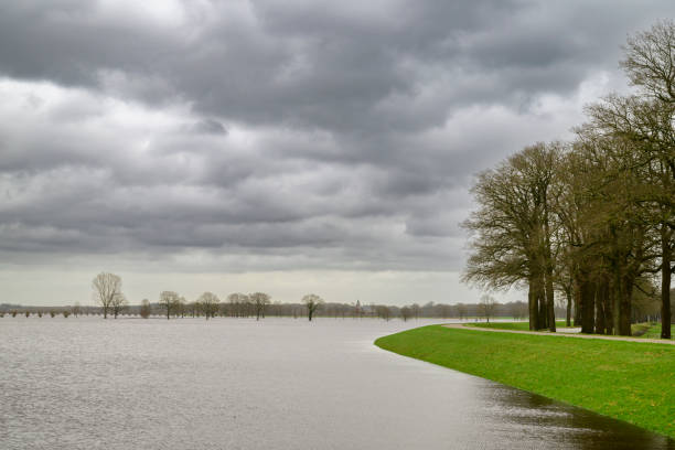 High water level in the river Vecht at the Dalfsen in the Dutch Vechtdal region in Overijssel, The Netherlands. The river is overflowing on the floodplains after heavy rainfal upstream in The Netherlands and Germany in December 2023.