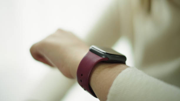 istock Woman talking with voice assistant on smartwatch. 2177393619