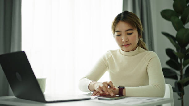 istock Businesswoman calculate bill. 2177393645
