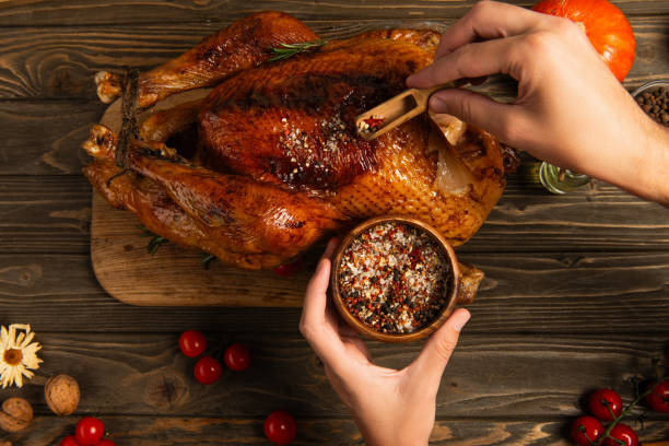istock Thanksgiving feast with a roasted turkey and delicious sides on the table 2177393718