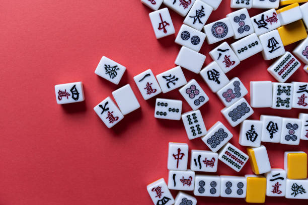 istock Mahjong tiles background on red background 2177394970