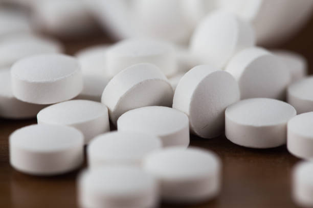 istock Close up of white pills. 2177398714