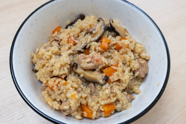 istock Chicken and mushroom rice 2177399883