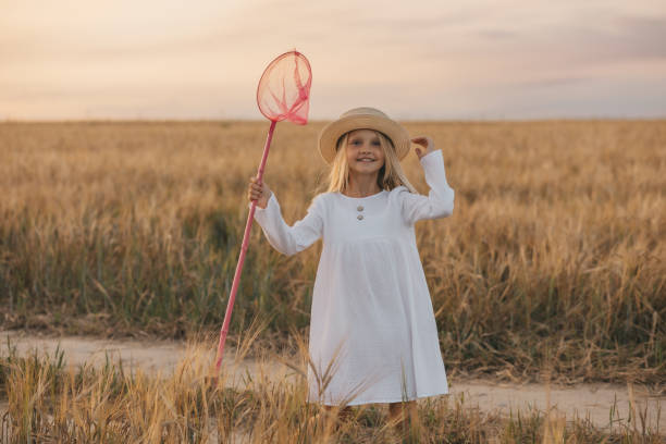 istock kids walk in the Evening in rye 2177401130