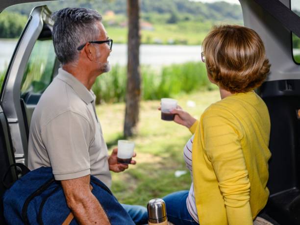 istock Mature couple is relaxing by the lake 2177402359