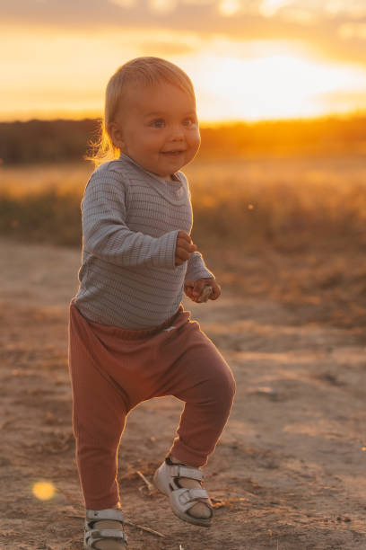 istock kids walk in the Evening in rye 2177402390
