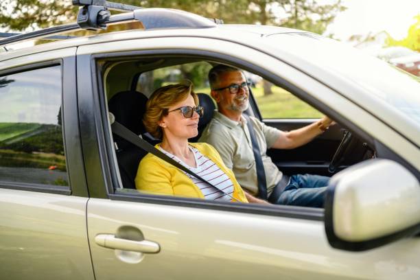 istock Happy couple enjoying while traveling by SUV 2177402669