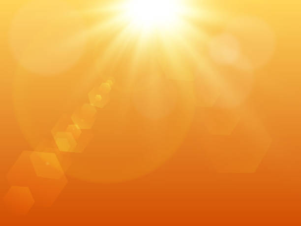 istock The sunlight effect is transparent and creates a unique glare on the lenses. Sun and bokeh On an orange background 2177407251