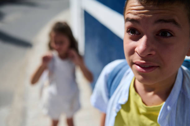 istock Close-up of a boy walking outdoors on a sunny day 2177407505