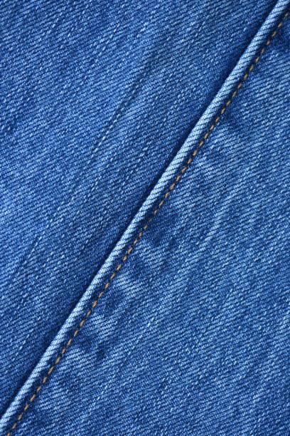 macro blue denim texture, blue denim texture as background close up photo from above