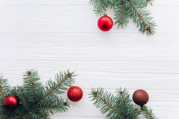 istock New year decorations on the white wooden background. 2177414039