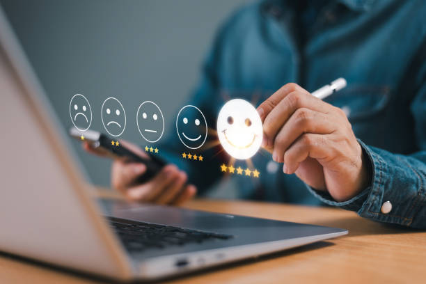 istock Customer satisfaction survey concept. Questionnaire business experience feedback service. Client use pen review happy face 5-star satisfaction rating online application. Check evaluate product quality 2177414538