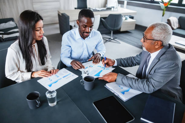 istock Diverse Business Team Collaborates in Modern Office 2177416085