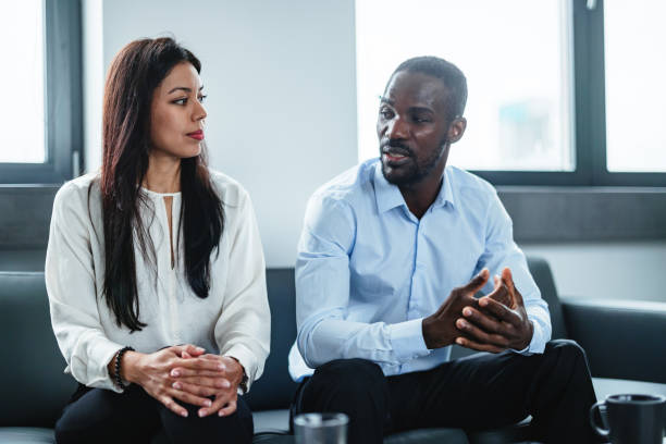 istock Black and Latin Business Professionals in Discussion 2177416121