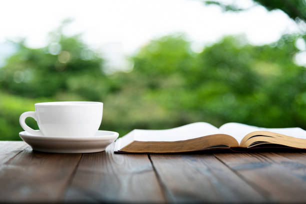 istock Drink coffee and book on the table 2177417992