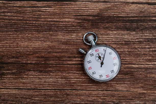 A stopwatch on the wooden table
