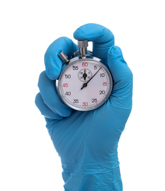 istock Doctor hand holding a stopwatch 2177418058