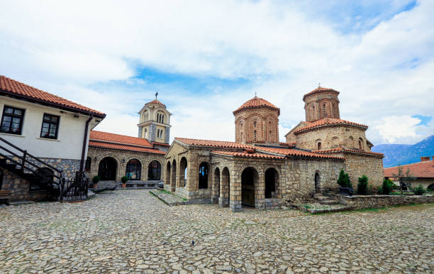Explore the historic Sveti Naum Monastery in Macedonia showcasing ancient architecture and serene surroundings amidst nature