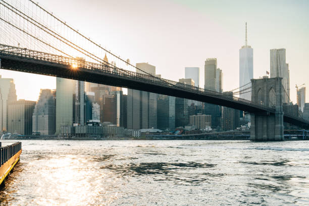 istock Brooklyn bridge connecting manhattan with brooklyn heights at sunset 2177423296