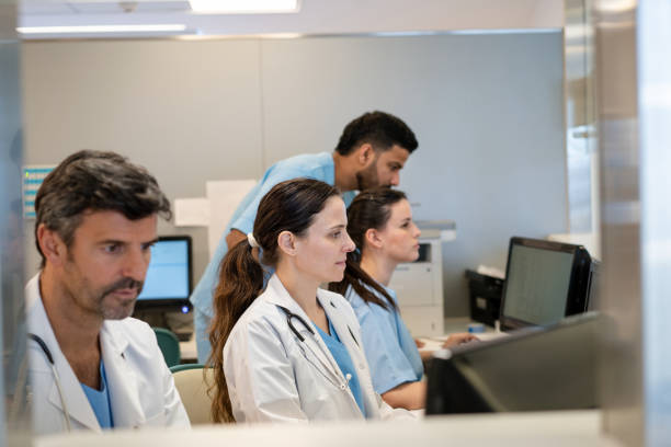 istock Medical and administrative staff working on computers in office 2177425137