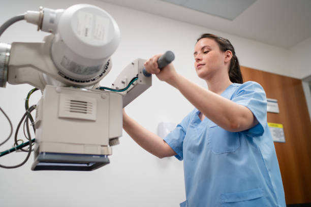 istock Medical technician setting up the X-ray machine in the clinic 2177425156