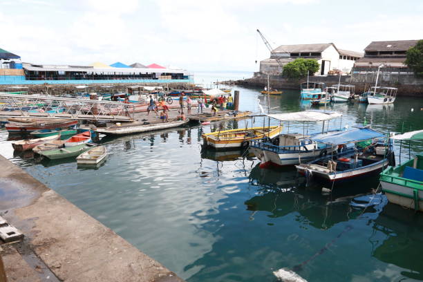 salvador, bahia, brazil - september 25, 2024: view of a fishing boat port next to the Sao Joaquim Fair in the city of Salvador.
