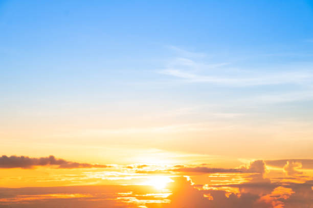 Beautiful , luxury soft gradient orange gold clouds and sunlight on the blue sky perfect for the background, take in everning,Twilight, Large size, high definition landscape photo