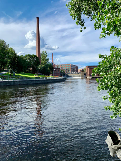 istock River and Old Industrial Chimney in a Historic Cityscape 2177436735
