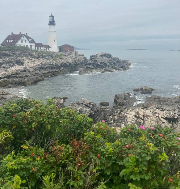 istock Lighthouse Portland Maine on the water 2177439769