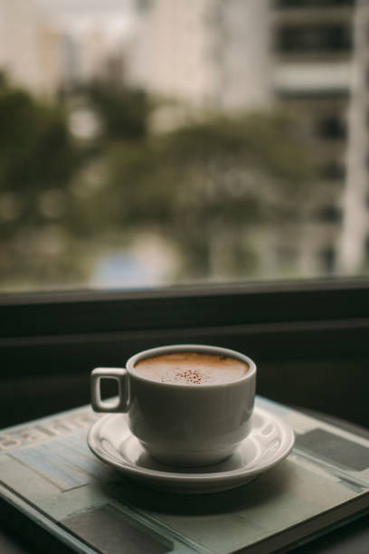 istock Coffee on a cloudy day near the window 2177440322