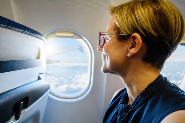 istock Mature woman on the airplane 2177442630