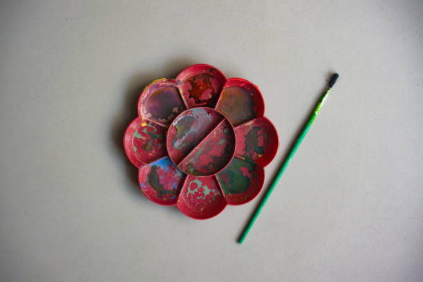 Watercolor ink holder and paint brush
