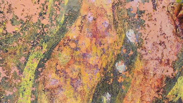 istock Abstract spray paint graffiti on rough worn metal texture. 2177447130